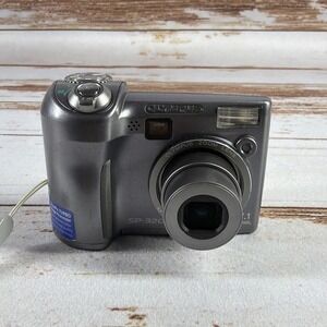 Olympus SP‑320 7.1MP Digital Camera 3x Optical Zoom Compact Point & Shoot Used